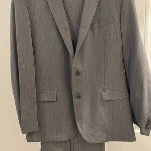 Men’s Warehouse Egara brand, two-piece gray suit, like new.